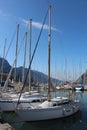 Series of sailboats, dock at Lake Riva, Italy