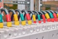 A series of several electrical wires connected to circuit breakers Royalty Free Stock Photo