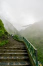 A series of stairs leading to the bhagsu falls in McLeodganj in himachal india Royalty Free Stock Photo