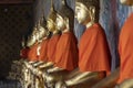 Statues of golden buddhas praying