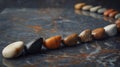 A series of stones p on different reflexology points ready to be utilized for hot stone reflexology to further promote Royalty Free Stock Photo