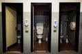Series of three toilets placed in the company