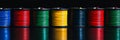 A series of vibrant, broad, and bright 3D printer filament spools displaying a panoramic array of colors