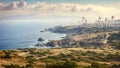 A series of wind turbines standing on a hill by the ocean, ready to harness the power of the wind, View from Cape Kaliakra to an