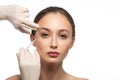 Serine woman receiving botox injection