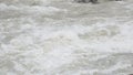 The Serio river swollen after heavy rainfall and floodwater crashing through valley