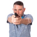 Serious adult man with a beard in a blue bow tie in summer shirt with a firearm in hand in hand aiming at you on an isolated white Royalty Free Stock Photo