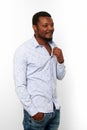 Serious african american black man in casual bright shirt with small beard, isolated background