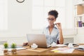 Serious business woman working on laptop at office Royalty Free Stock Photo