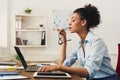 Serious business woman working on laptop at office Royalty Free Stock Photo