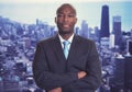 Serious african american businessman with skyline Royalty Free Stock Photo