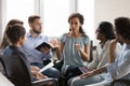 Serious African American group leader woman speaking on therapy meeting Royalty Free Stock Photo