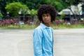 Serious african american male young adult with afro haistyle Royalty Free Stock Photo