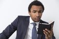 Serious African American man with a notebook Royalty Free Stock Photo