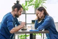 Serious young couple arguing, quarreling sitting together in cafeteria Royalty Free Stock Photo