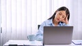 serious asian business woman Strong headache because working hard and stress from hard work in office Royalty Free Stock Photo