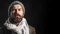 Serious attractive bearded man in leather jacket, white scarf and gray hat. Men fashion style. Bearded man in warm Royalty Free Stock Photo