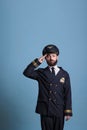 Serious aviation academy airplane aviator saluting