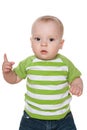 Serious baby boy shows his finger up Royalty Free Stock Photo