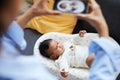 Serious baby in cozy cocoon Royalty Free Stock Photo