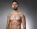 Serious bare man with tattoo Royalty Free Stock Photo