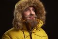 Serious bearded man wearing winter clothes