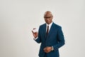 Serious black business man showing business card Royalty Free Stock Photo