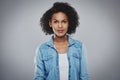Serious black woman with blue jean shirt Royalty Free Stock Photo