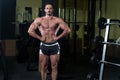 Serious Body Builder Standing In The Gym Royalty Free Stock Photo