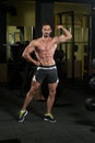 Serious Body Builder Standing In The Gym Royalty Free Stock Photo