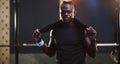 Serious, bodybuilder and portrait of black man in gym for training, exercise and strong workout. Fitness, muscles and