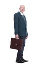 serious business man with a leather briefcase looking at you. Royalty Free Stock Photo