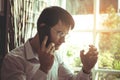 Serious Business man making call on his mobile phone Royalty Free Stock Photo