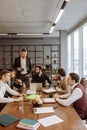 Serious business people hold meeting in office Royalty Free Stock Photo