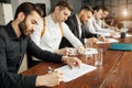 Serious business people hold meeting in office Royalty Free Stock Photo