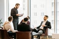 Serious business people hold meeting in office Royalty Free Stock Photo