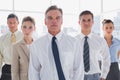 Serious business people standing together Royalty Free Stock Photo