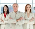 Serious business team with folded arms Royalty Free Stock Photo