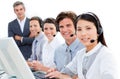 Serious business team with headset on Royalty Free Stock Photo