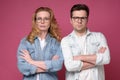 Serious business team of mature man and woman in glasses looking at camera. Royalty Free Stock Photo