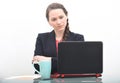 Serious business woman looking at computer Royalty Free Stock Photo