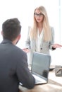 Serious business woman talking to her colleague Royalty Free Stock Photo