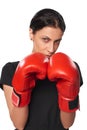 Serious business woman wearing boxing gloves Royalty Free Stock Photo