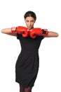 Serious business woman wearing boxing gloves Royalty Free Stock Photo