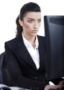 Serious business woman working in computer Royalty Free Stock Photo