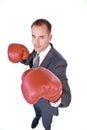 Serious businessman boxing