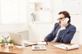 Serious businessman having phone talk Royalty Free Stock Photo