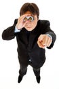 Serious businessman looking through binoculars Royalty Free Stock Photo