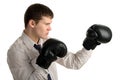 Serious businessman in sports boxing stance