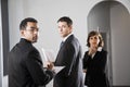 Serious businesspeople looking over shoulder Royalty Free Stock Photo